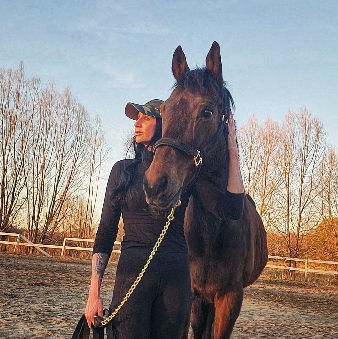 Eleanor with one of her horses at golden hour